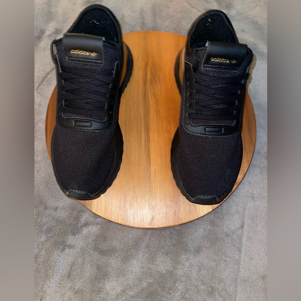 Black and gold mens adidas sneakers